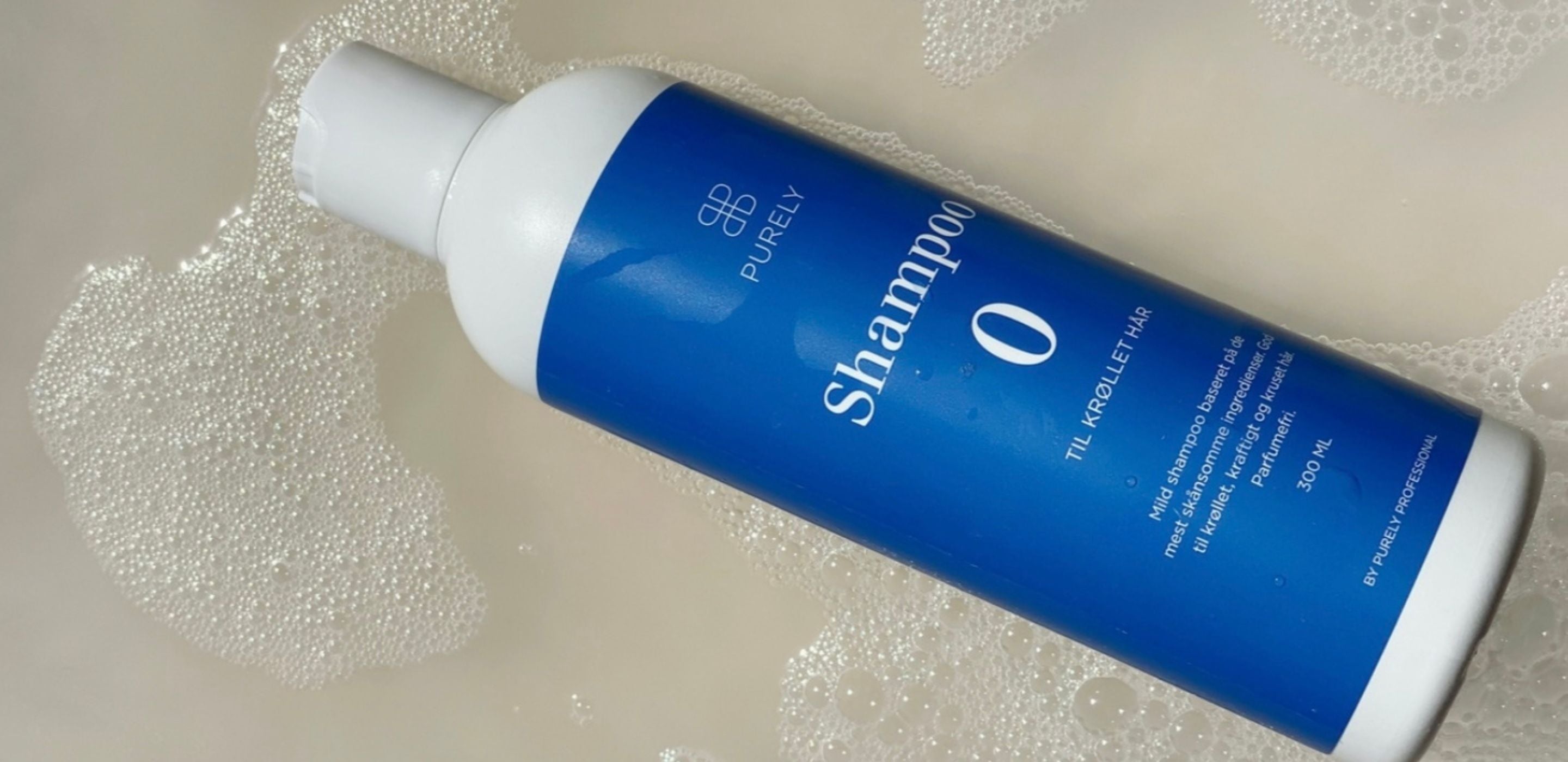 Shampoo til kruset hår der dæmper frizz og giver mere glans